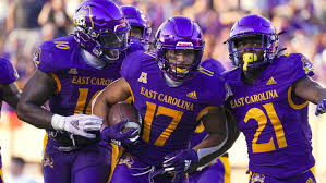 Gridiron Gamble: ECU Pirate Football Star Demands Salary Hike or Else, Amid Rumors of Arch Manning’s Potential Recruitment